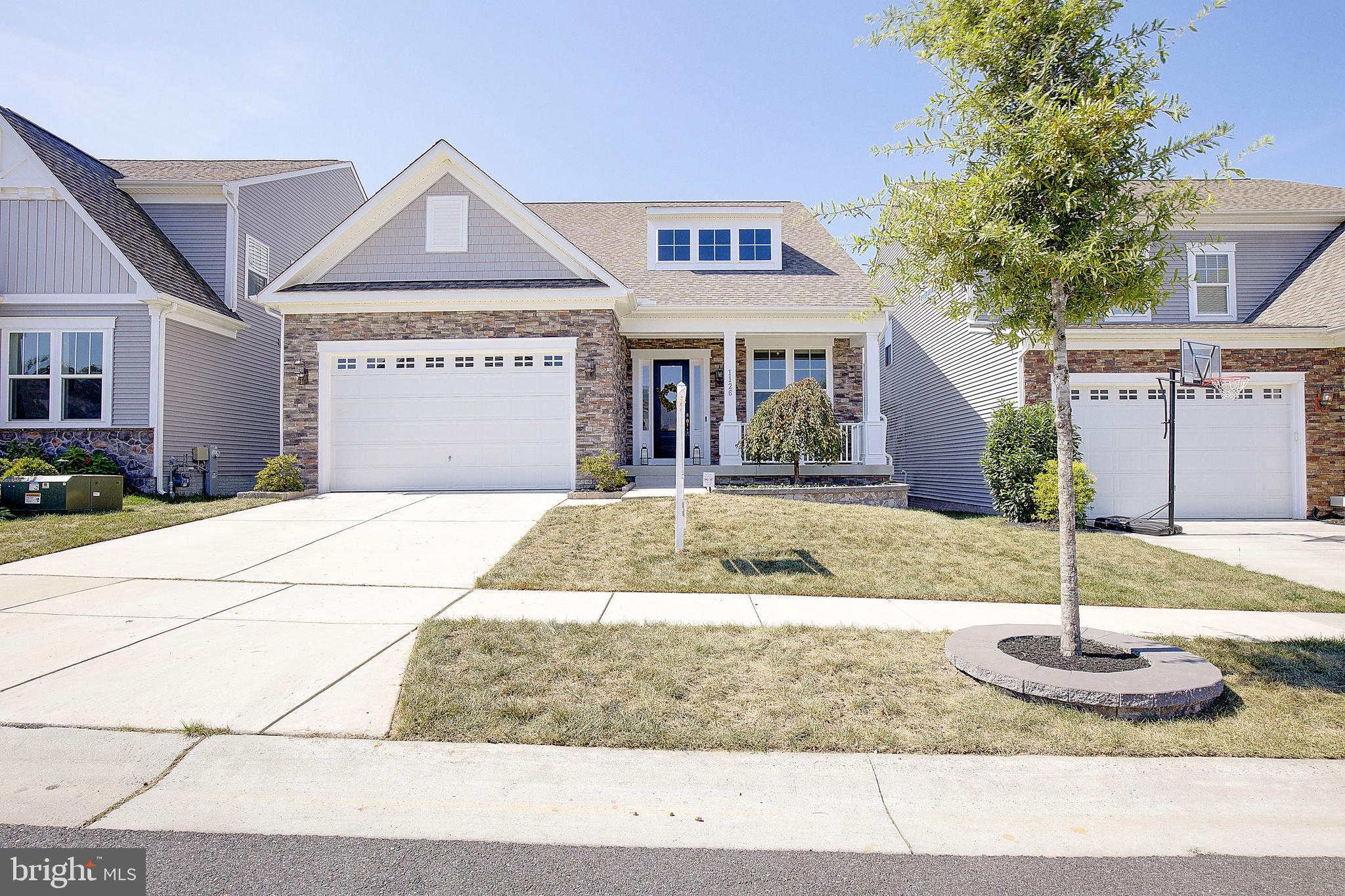 1126 White Clover Lane Odenton, MD 21113 - Photo 78 of 92 a front view of a house with garden