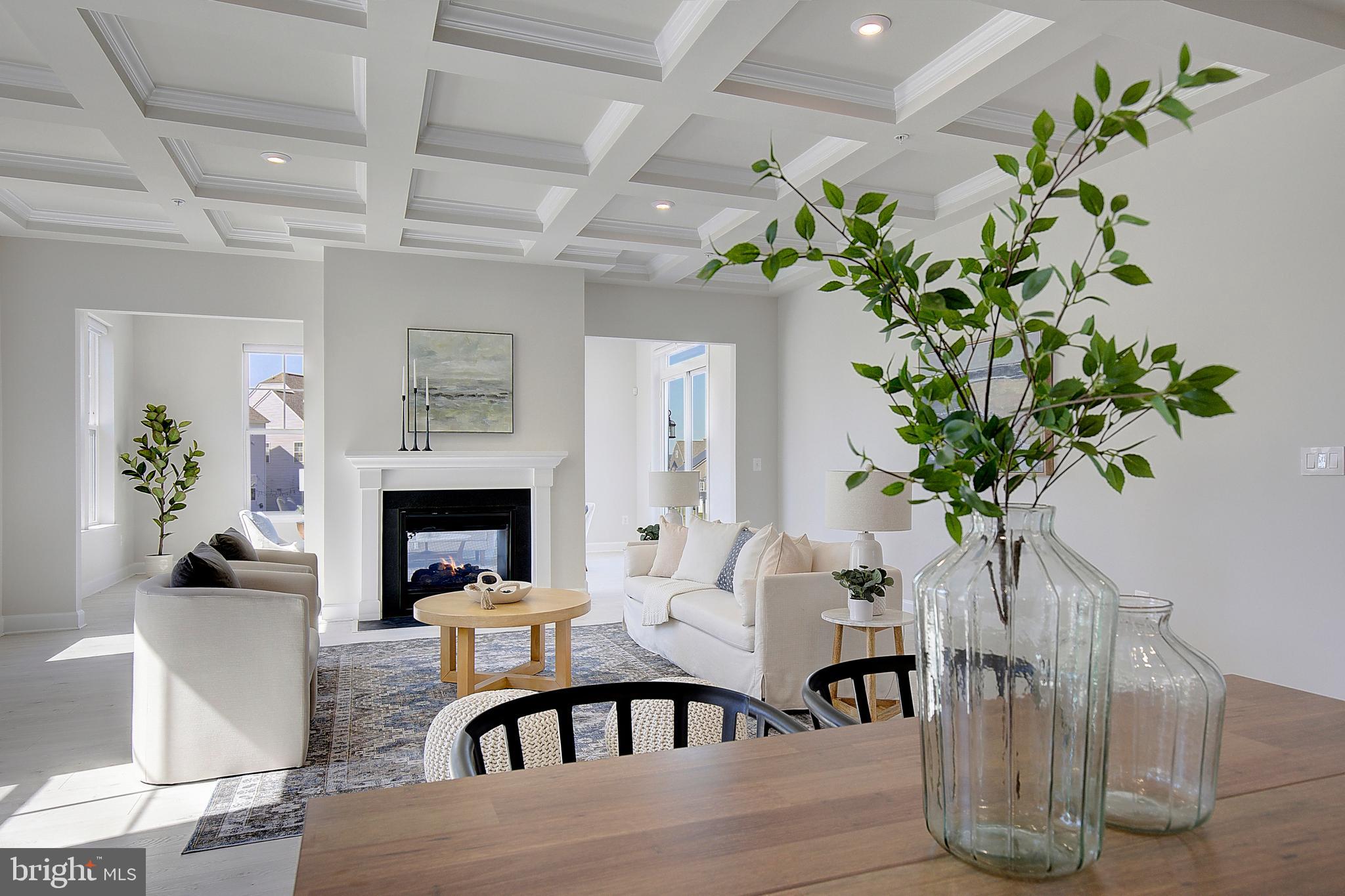 1126 White Clover Lane Odenton, MD 21113 - Photo 10 of 92 a living room with furniture fireplace and flower vase