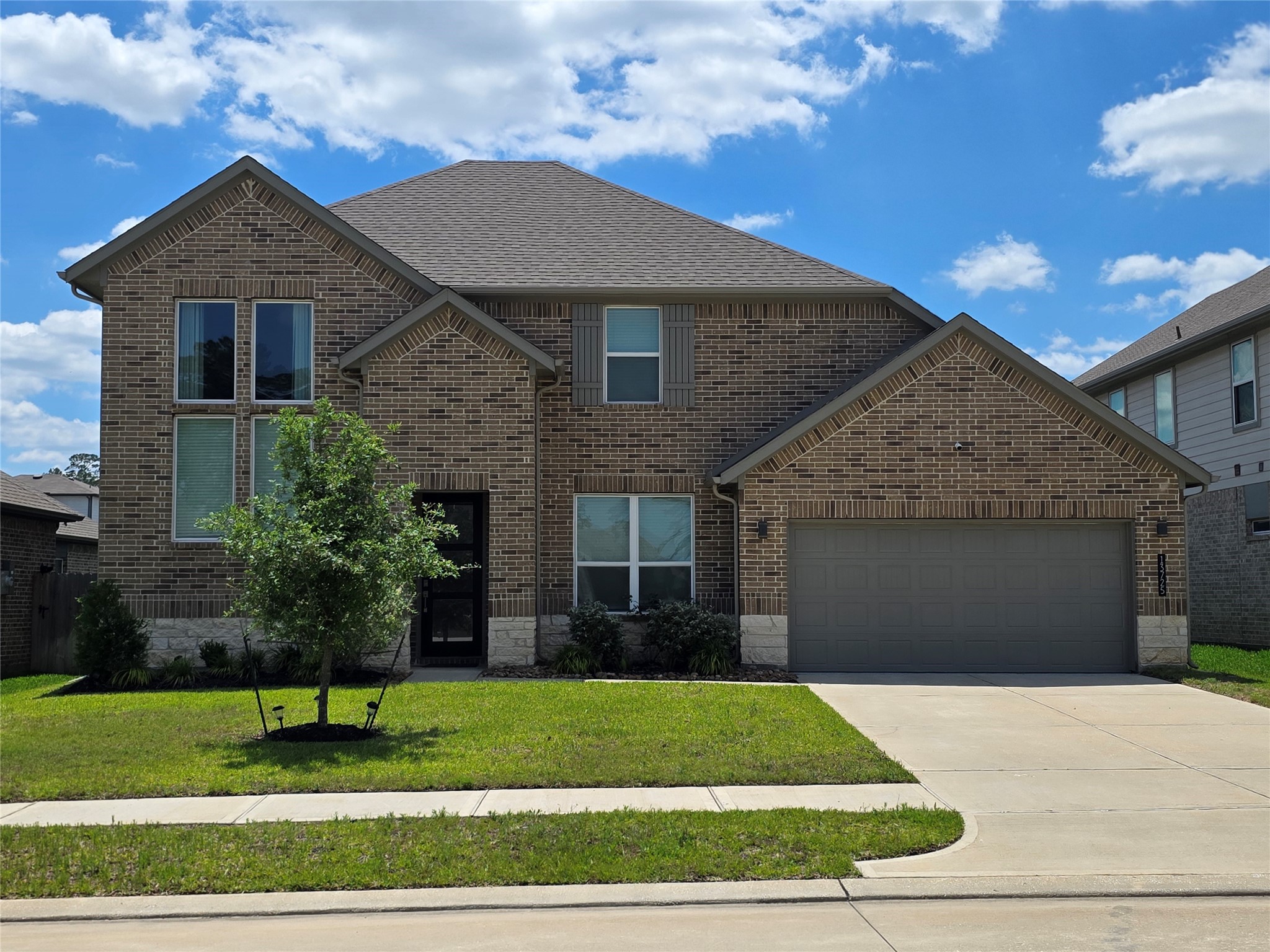 13725 Rising Sun Lane Conroe, TX 77384 - Photo 1 of 29 a house that has a yard