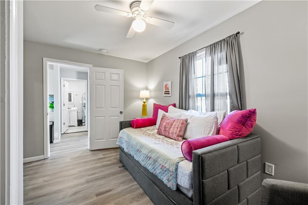 2220 Lee Street Southwest Covington, GA 30014 - Photo 12 of 30 a living room with furniture and a window