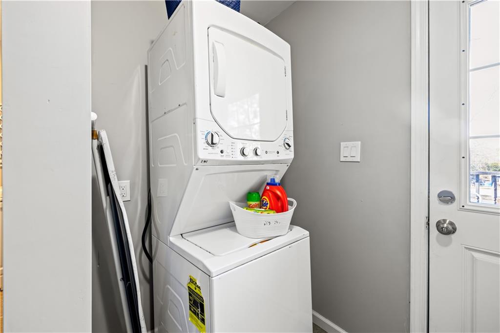 2220 Lee Street Southwest Covington, GA 30014 - Photo 13 of 30 a utility room with dryer and washer