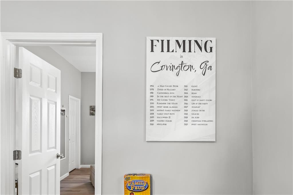 2220 Lee Street Southwest Covington, GA 30014 - Photo 21 of 30 a view of a hallway with wooden floor
