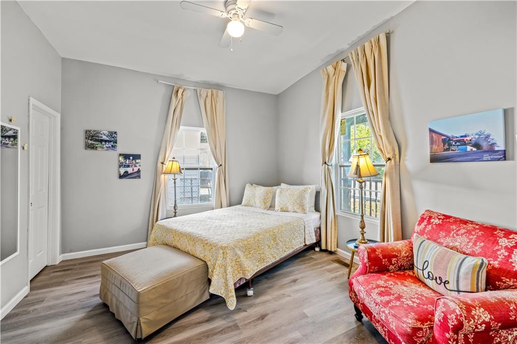 2220 Lee Street Southwest Covington, GA 30014 - Photo 22 of 30 a bedroom with a bed and window