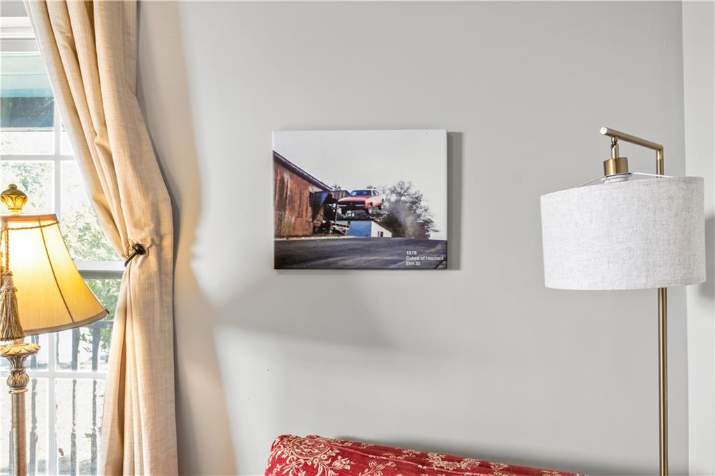 2220 Lee Street Southwest Covington, GA 30014 - Photo 27 of 30 a picture of a bathroom with a sink and a mirror