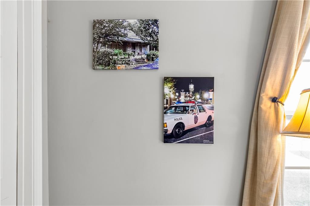 2220 Lee Street Southwest Covington, GA 30014 - Photo 28 of 30 a bedroom with a bed and a window