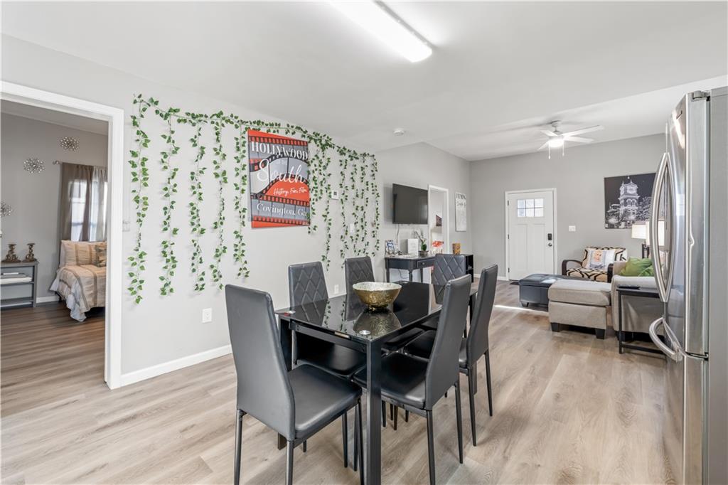 2220 Lee Street Southwest Covington, GA 30014 - Photo 10 of 30 a view of a livingroom with furniture and wooden floor