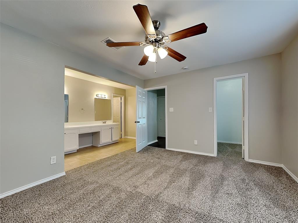 7621 Pebble Beach Drive Rowlett, TX 75088 - Photo 8 of 20 a view of an empty room with a window