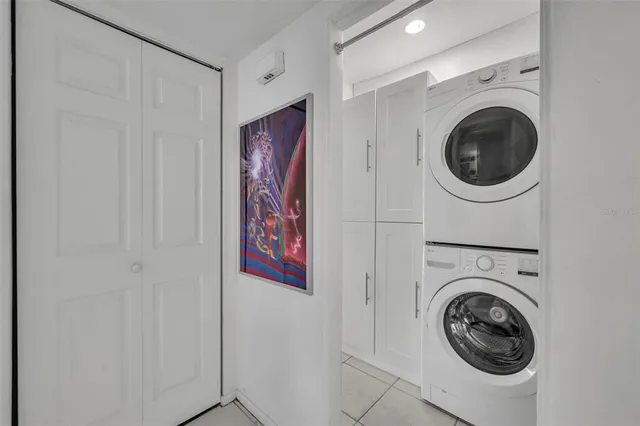 a view of a hallway with washer and dryer