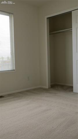 7775 Tompkins Road Peyton, CO 80831 - Photo 6 of 8 Main level bedroom