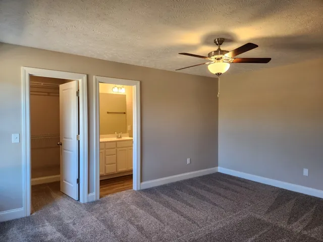 a bathroom with a toilet and a sink