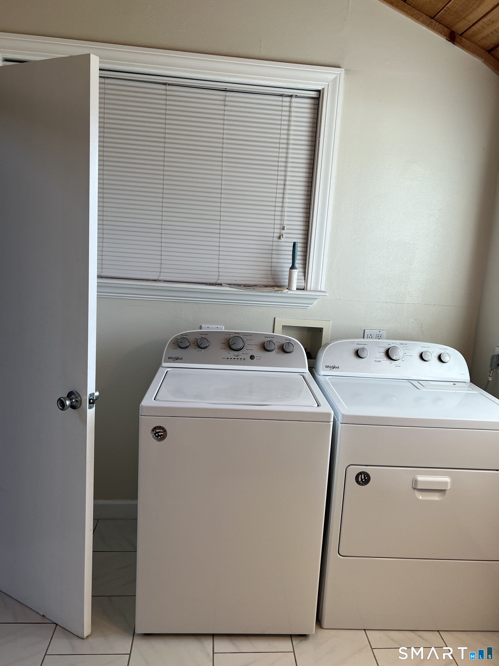 311 Racebrook Road Orange, CT 06477 - Photo 7 of 12 a utility room with dryer and washer