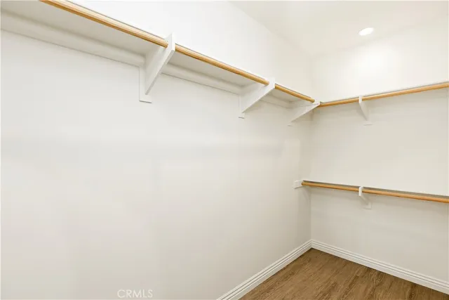 a view of a room with racks on the wall