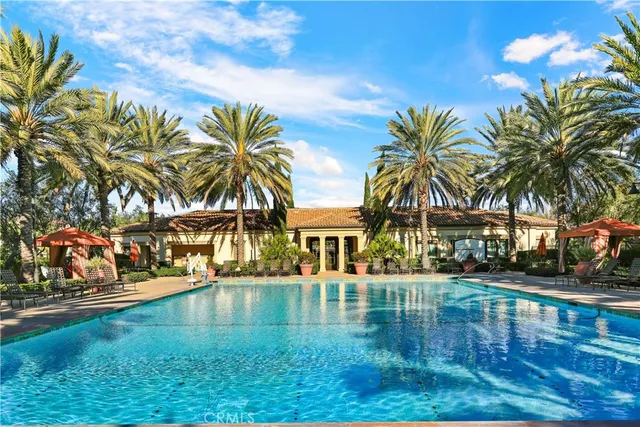a view of a swimming pool with a garden