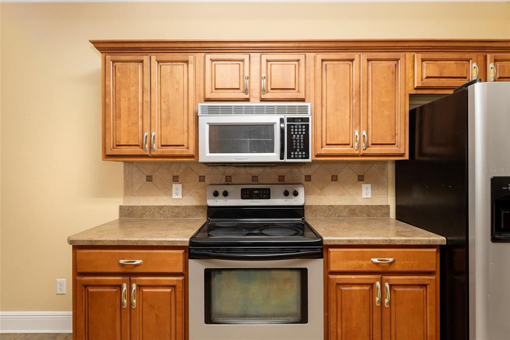 191 Slaughter Road Palatka, FL 32177 - Photo 16 of 62 a stove top oven sitting inside of a kitchen