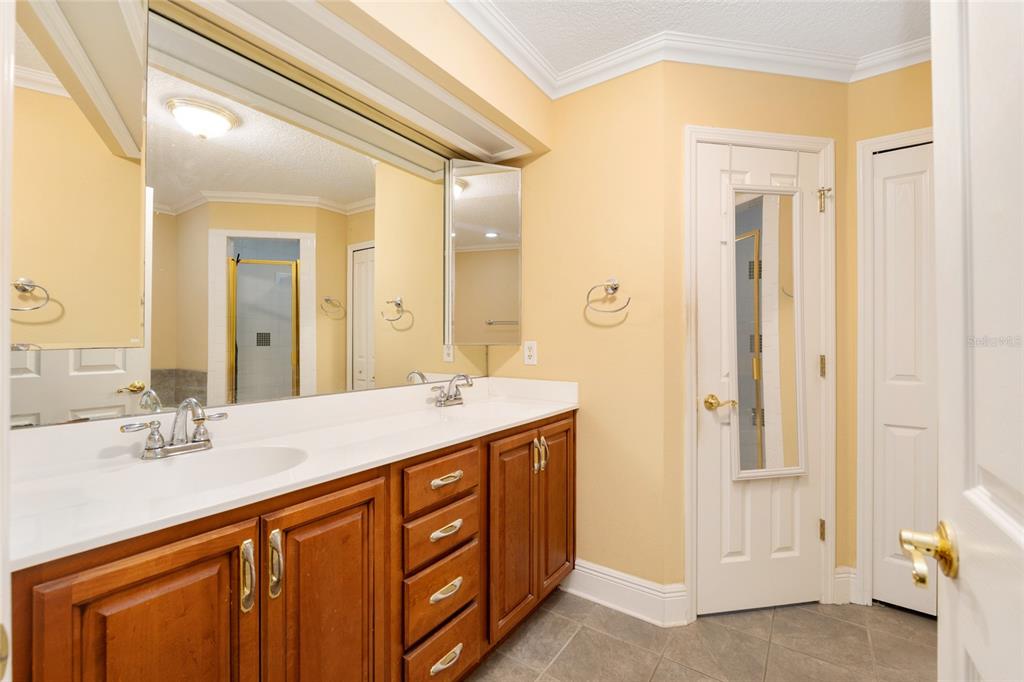 191 Slaughter Road Palatka, FL 32177 - Photo 24 of 62 a bathroom with a double vanity sink mirror and