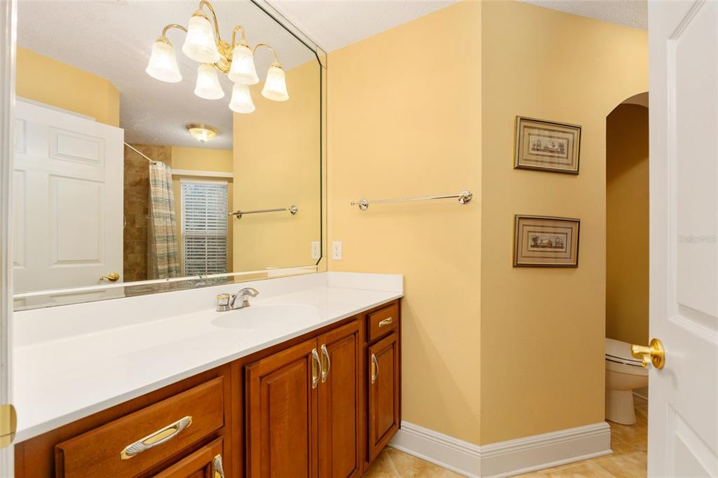 191 Slaughter Road Palatka, FL 32177 - Photo 34 of 62 a bathroom with a sink a mirror and a shower