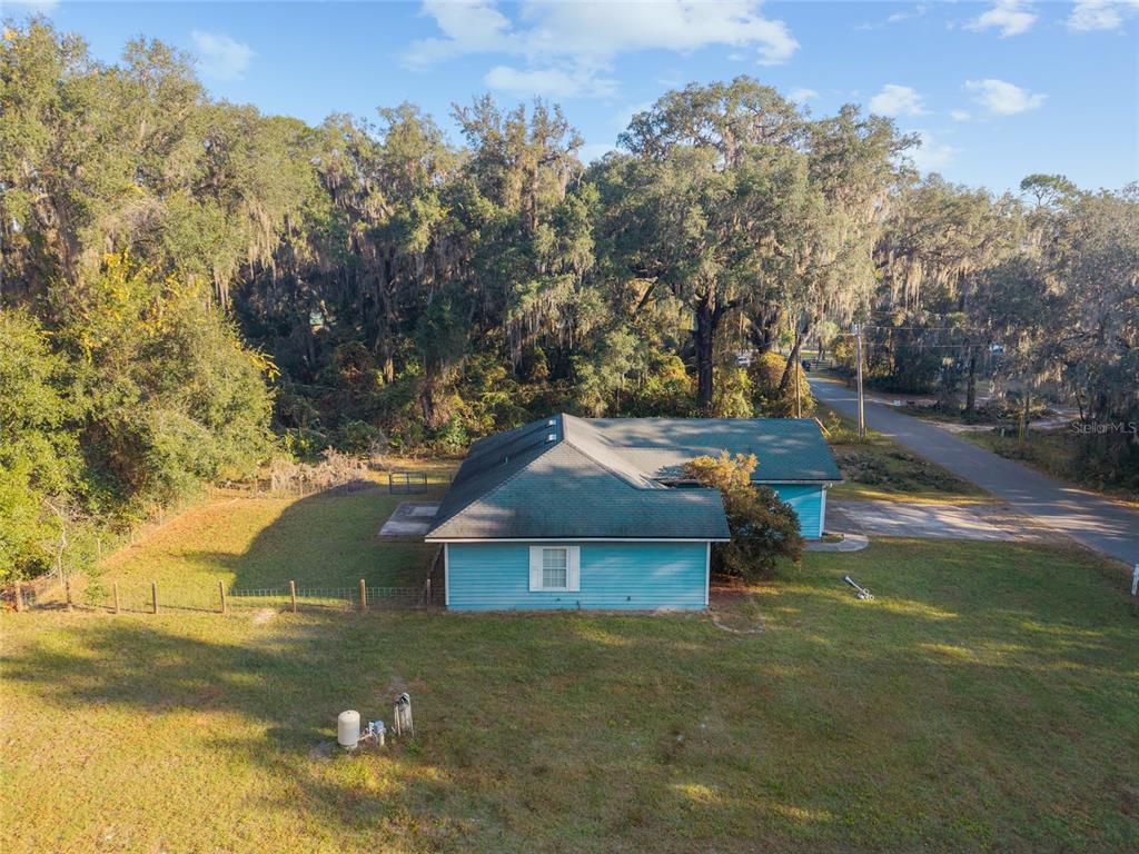 191 Slaughter Road Palatka, FL 32177 - Photo 49 of 62 a view of a house with a yard