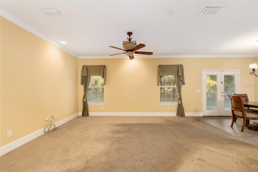 191 Slaughter Road Palatka, FL 32177 - Photo 10 of 62 a view of a livingroom with a staircase