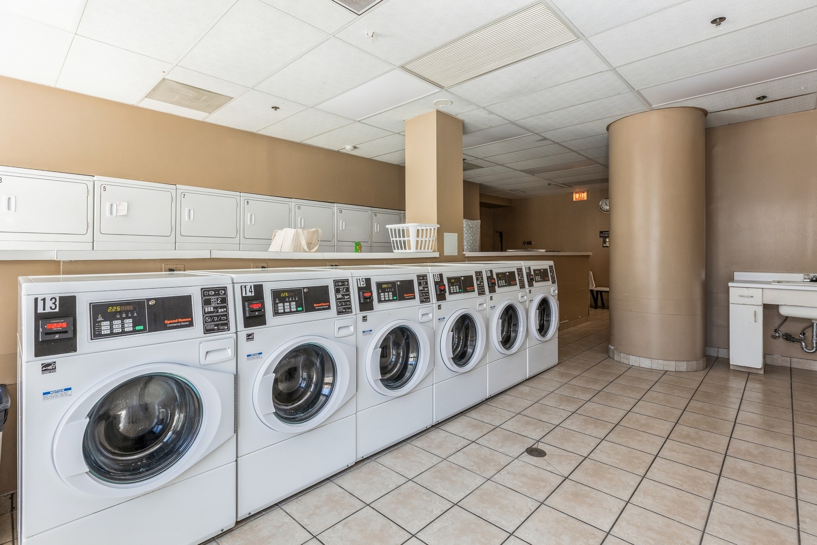 111 West Maple Street, Unit 1208 Chicago, IL 60610 - Photo 13 of 14 a utility room with dryer and washer
