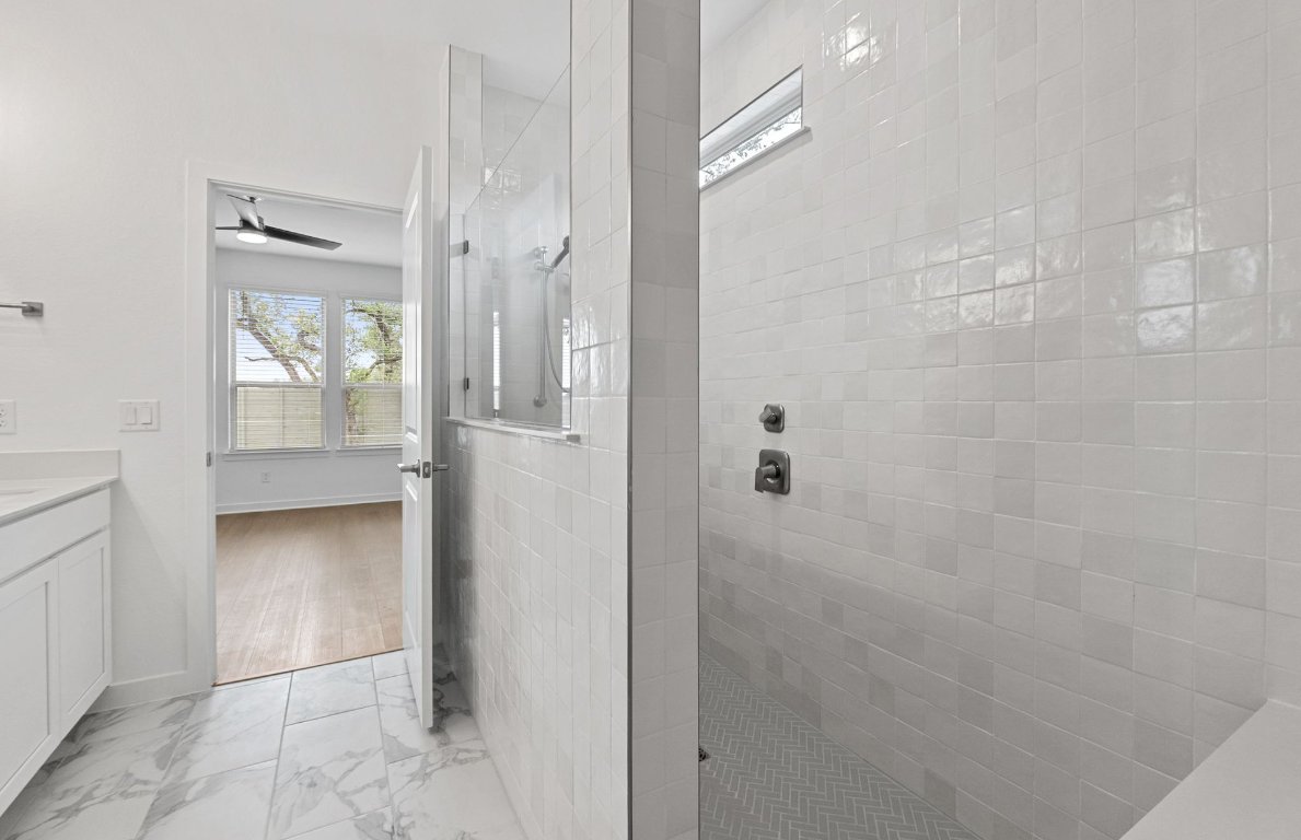 1700 Spg Mountain Cove Georgetown, TX 78628 - Photo 18 of 40 a bathroom with a shower