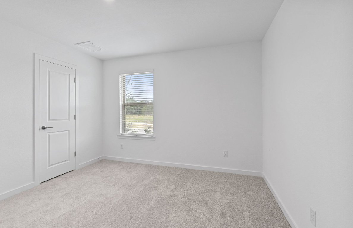 1700 Spg Mountain Cove Georgetown, TX 78628 - Photo 26 of 40 a view of an empty room with a window