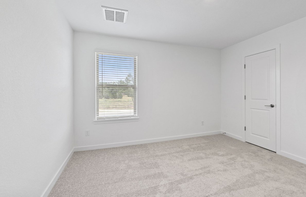 1700 Spg Mountain Cove Georgetown, TX 78628 - Photo 27 of 40 an empty room with a window