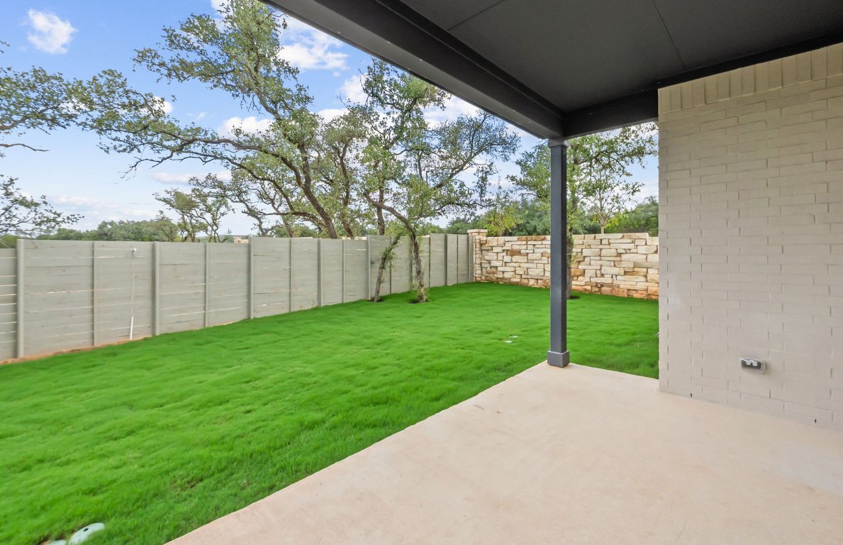 1700 Spg Mountain Cove Georgetown, TX 78628 - Photo 34 of 40 a view of a yard with porch