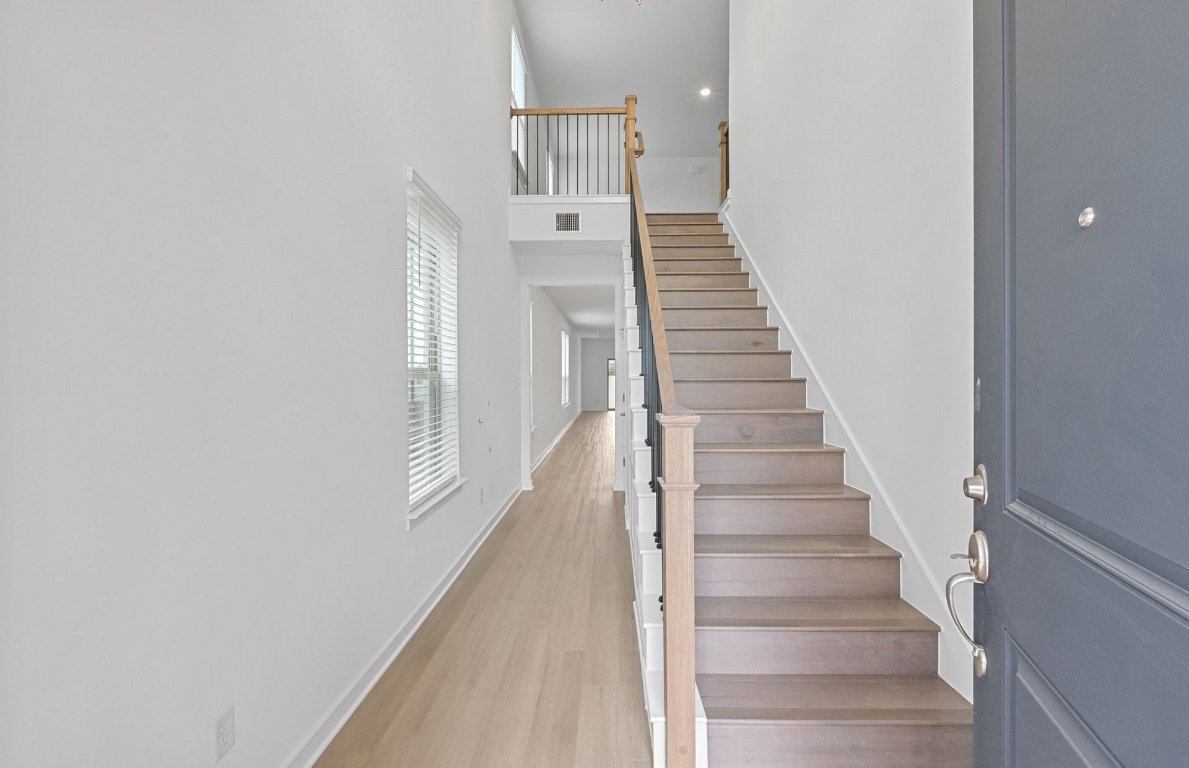 1700 Spg Mountain Cove Georgetown, TX 78628 - Photo 5 of 40 a view of entryway and hall with wooden floor