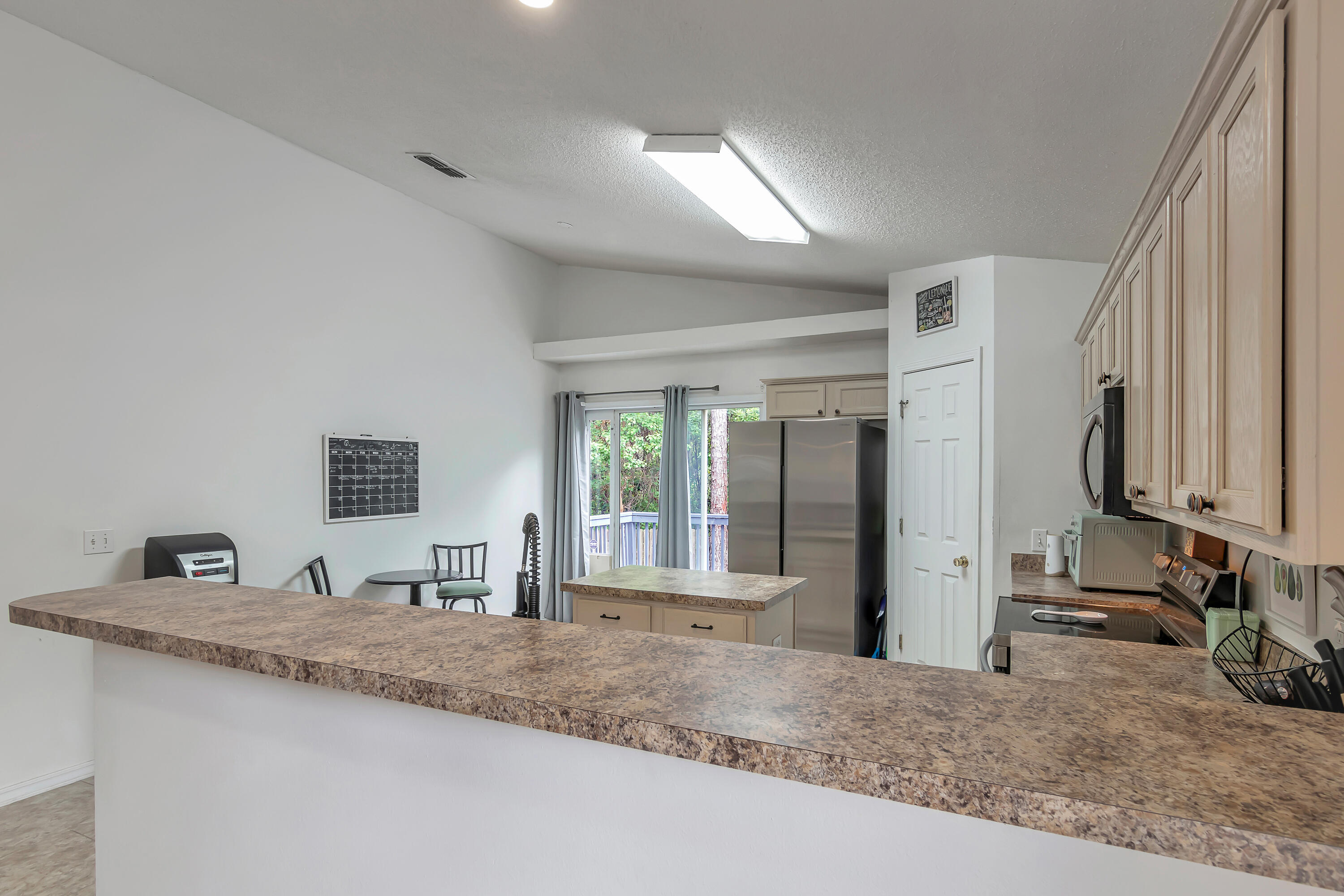270 Limestone Circle Crestview, FL 32539 - Photo 11 of 35 a view of a sink and a large mirror in a room