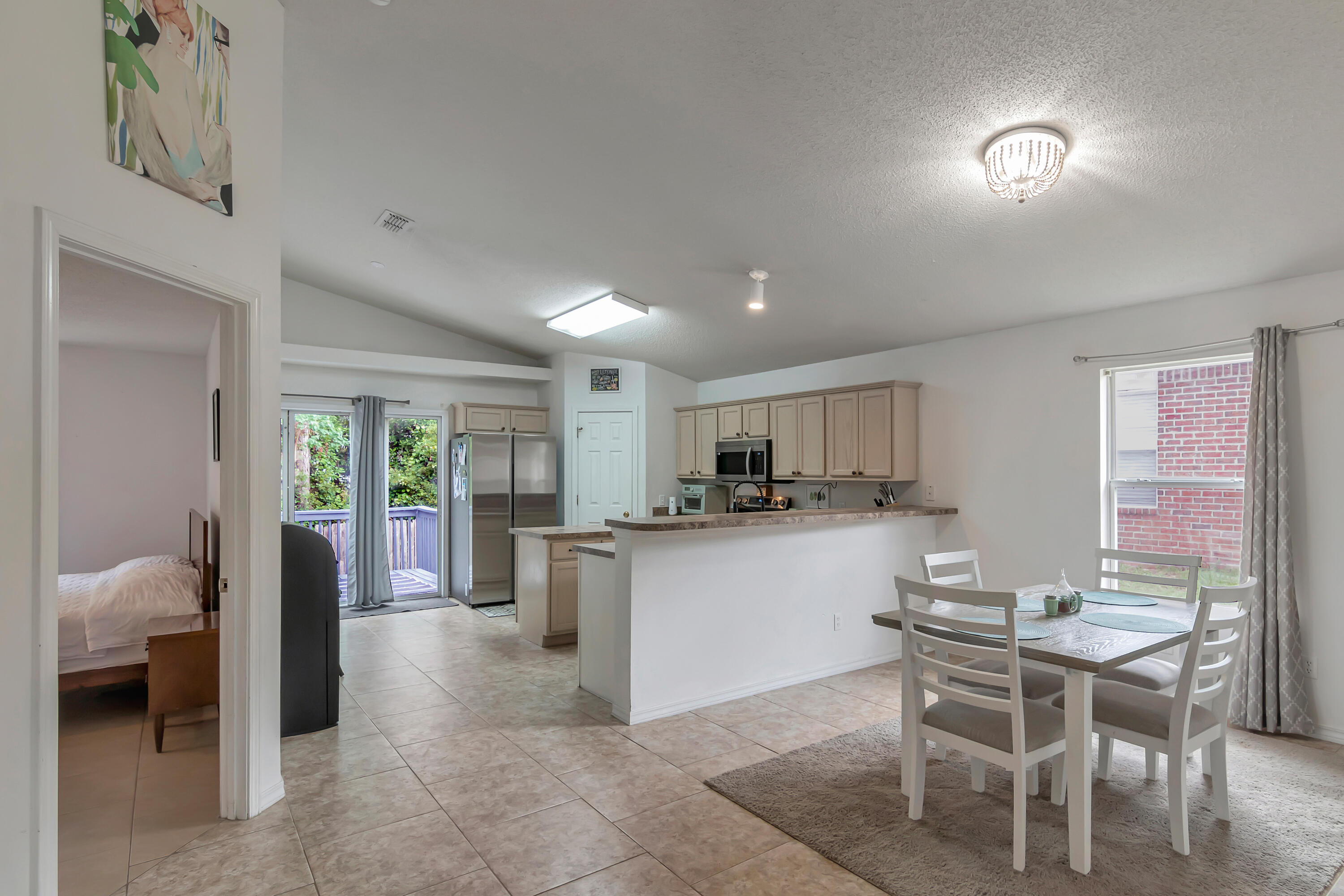 270 Limestone Circle Crestview, FL 32539 - Photo 15 of 35 a kitchen with a sink cabinets and wooden floor