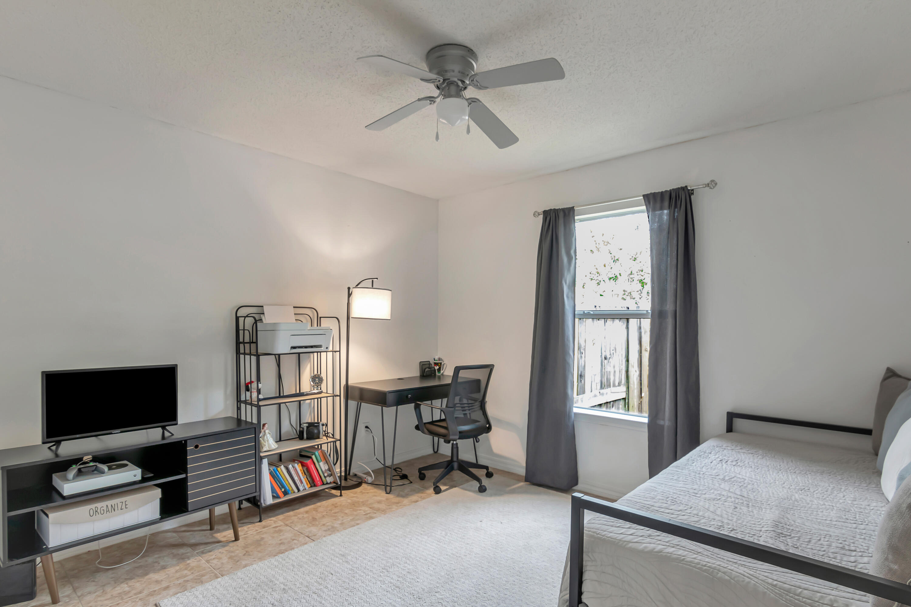 270 Limestone Circle Crestview, FL 32539 - Photo 23 of 35 a view of a livingroom with workspace and a window