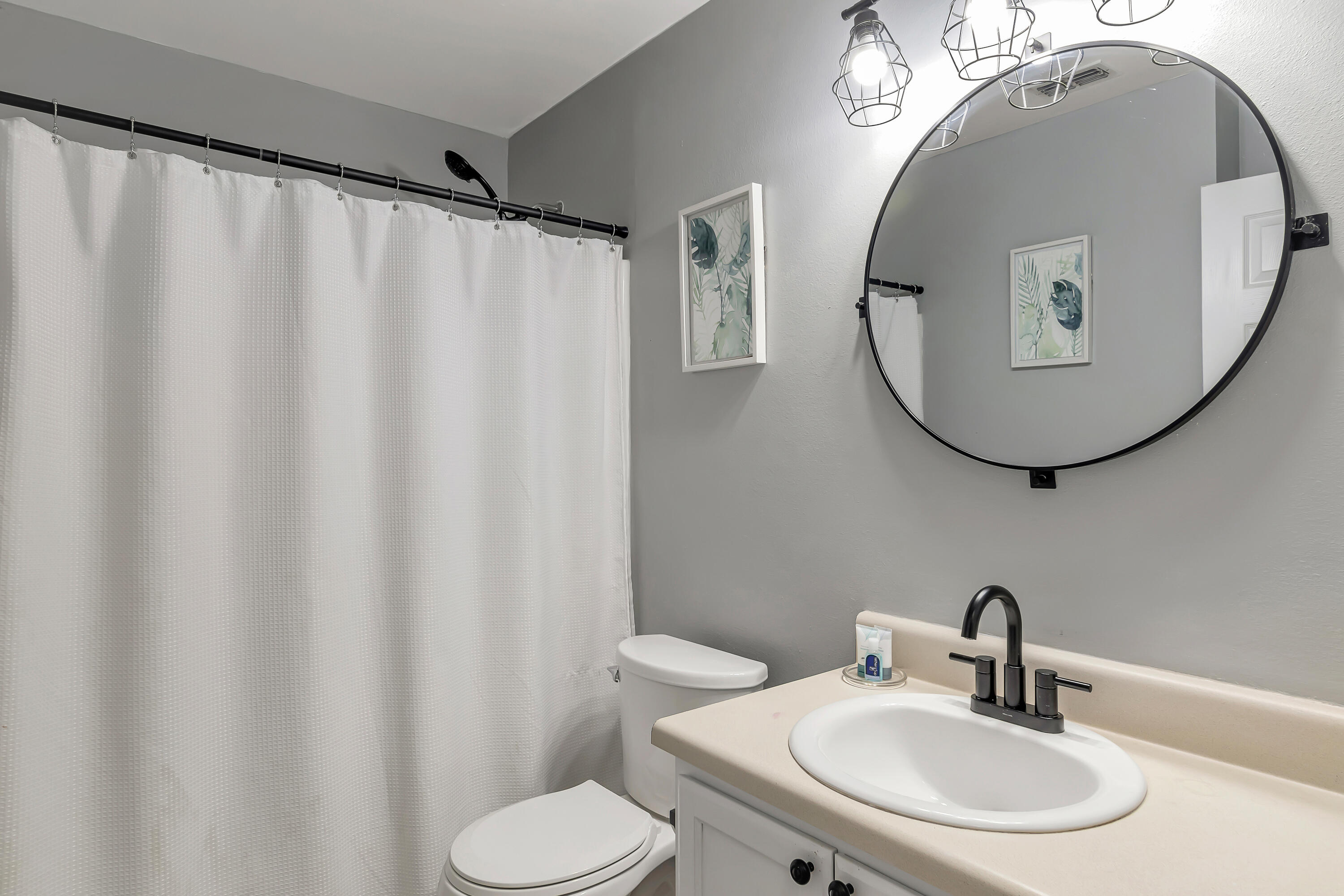 270 Limestone Circle Crestview, FL 32539 - Photo 25 of 35 a bathroom with a sink and mirror