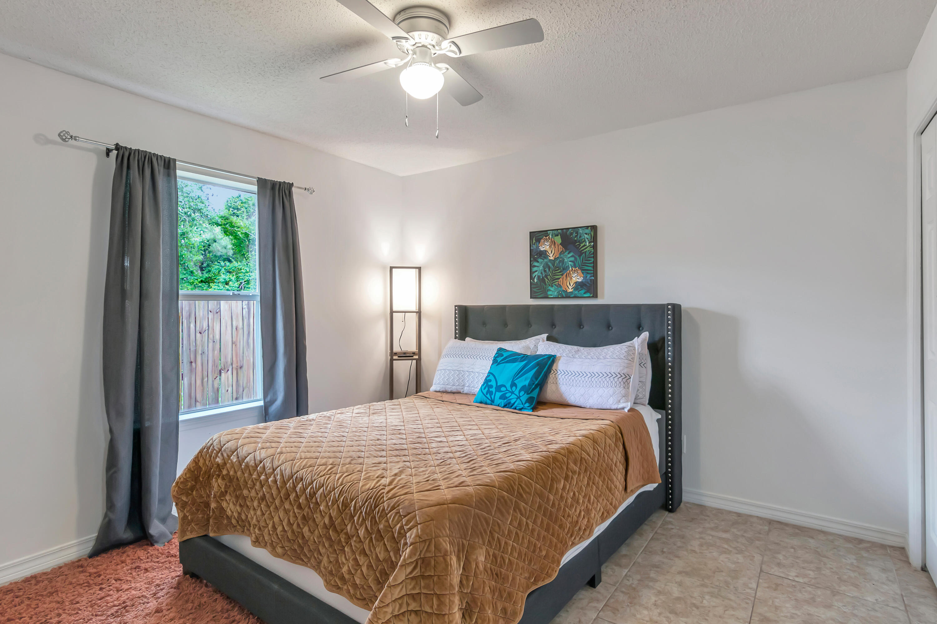 270 Limestone Circle Crestview, FL 32539 - Photo 26 of 35 a bedroom with a bed and window