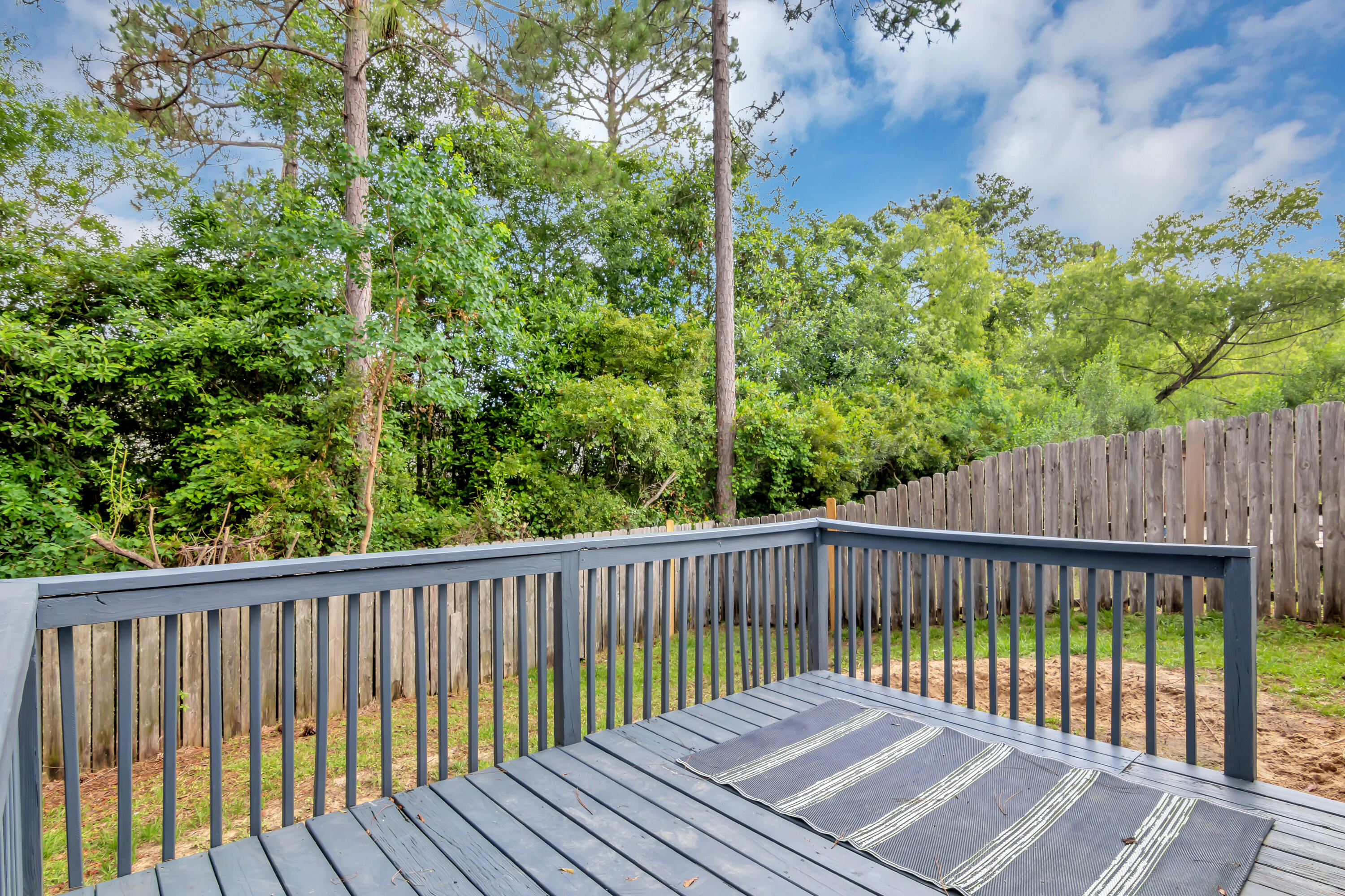 270 Limestone Circle Crestview, FL 32539 - Photo 31 of 35 a balcony with wooden floor