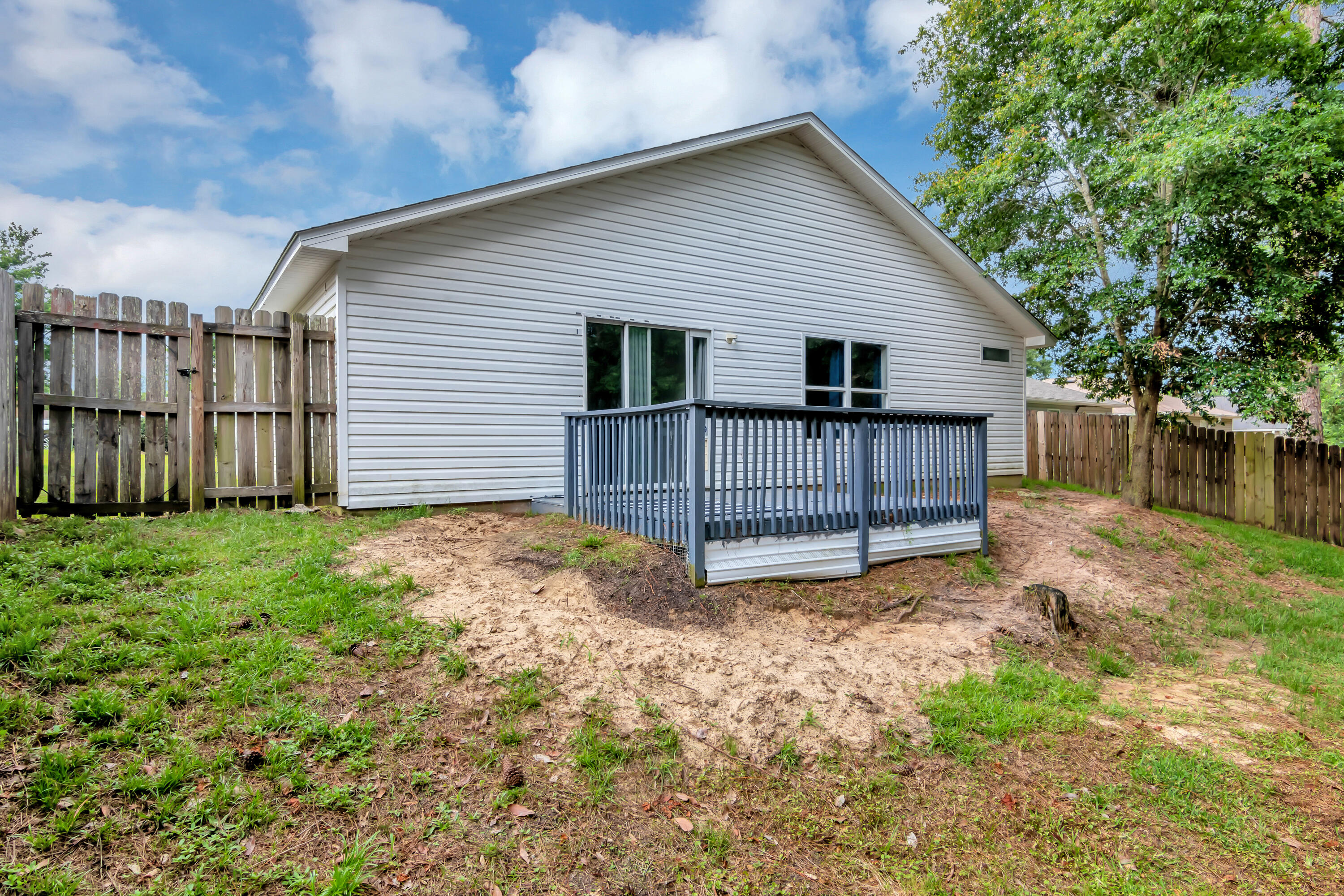 270 Limestone Circle Crestview, FL 32539 - Photo 35 of 35 a view of a small house with wooden fence