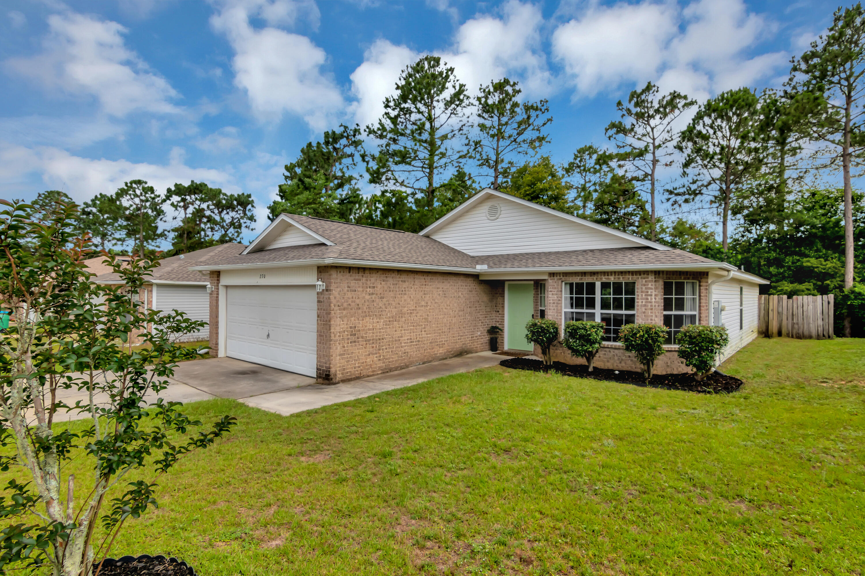 270 Limestone Circle Crestview, FL 32539 - Photo 4 of 35 a front view of a house with patio