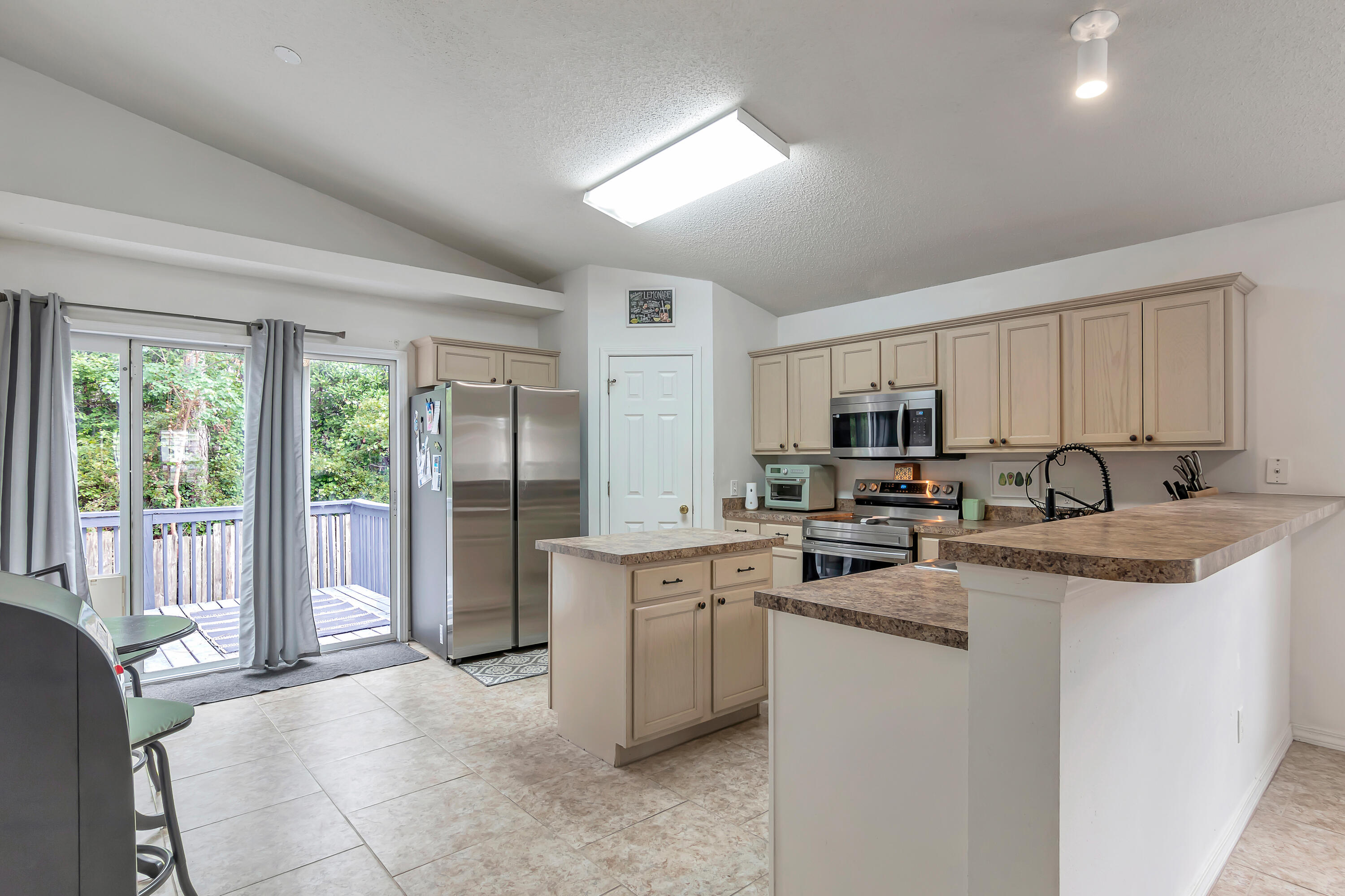 270 Limestone Circle Crestview, FL 32539 - Photo 10 of 35 a kitchen with a sink stove and cabinets
