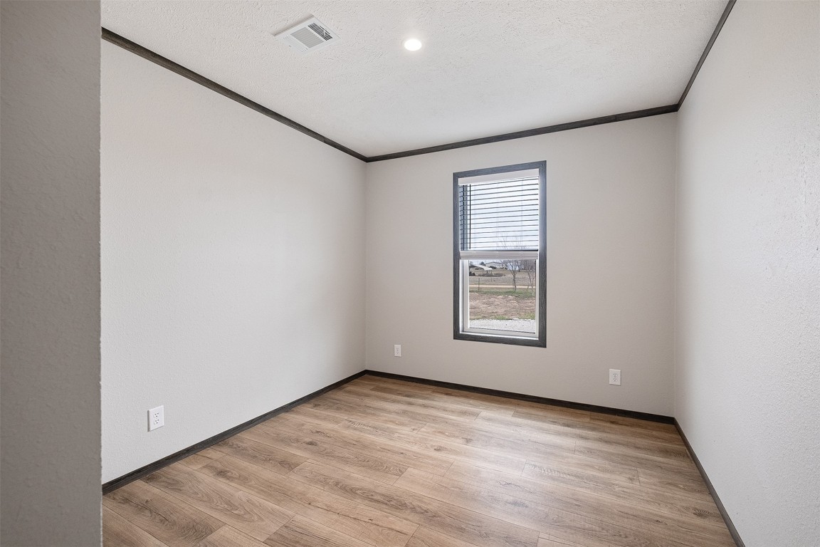 339 Lower Red Rock Road Bastrop, TX 78602 - Photo 17 of 29 an empty room with a window