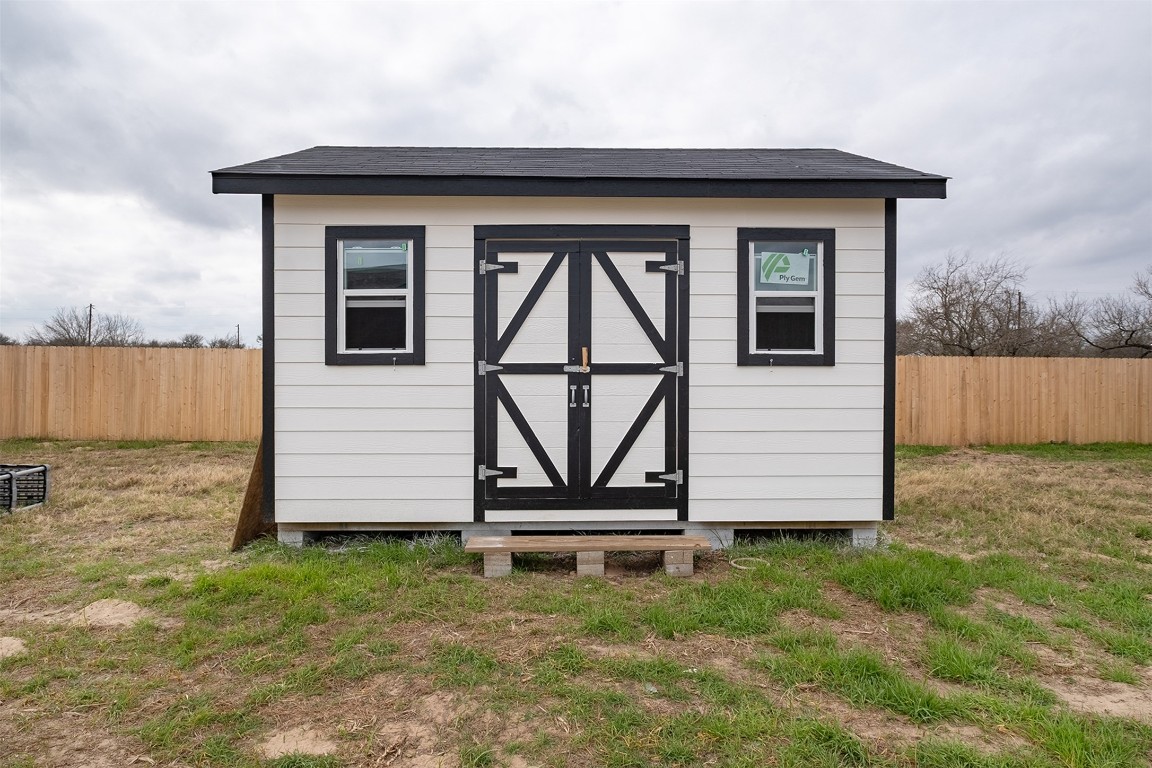 339 Lower Red Rock Road Bastrop, TX 78602 - Photo 24 of 29 a front view of a house with a yard