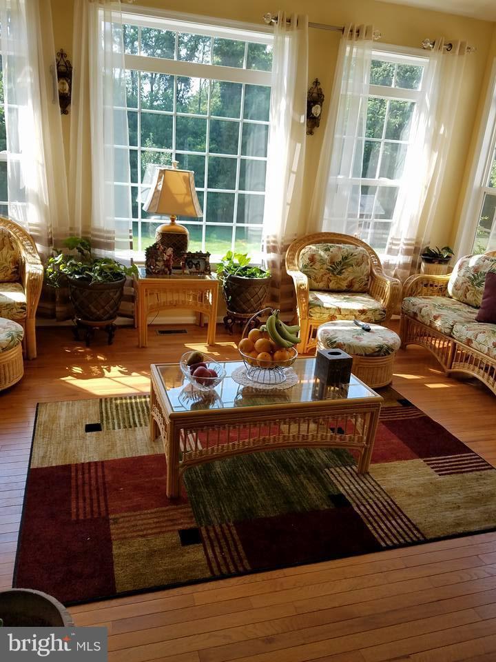 14108 Jones Bridge Road Upper Marlboro, MD 20774 - Photo 14 of 36 Solarium - retreat with vibrant decor.