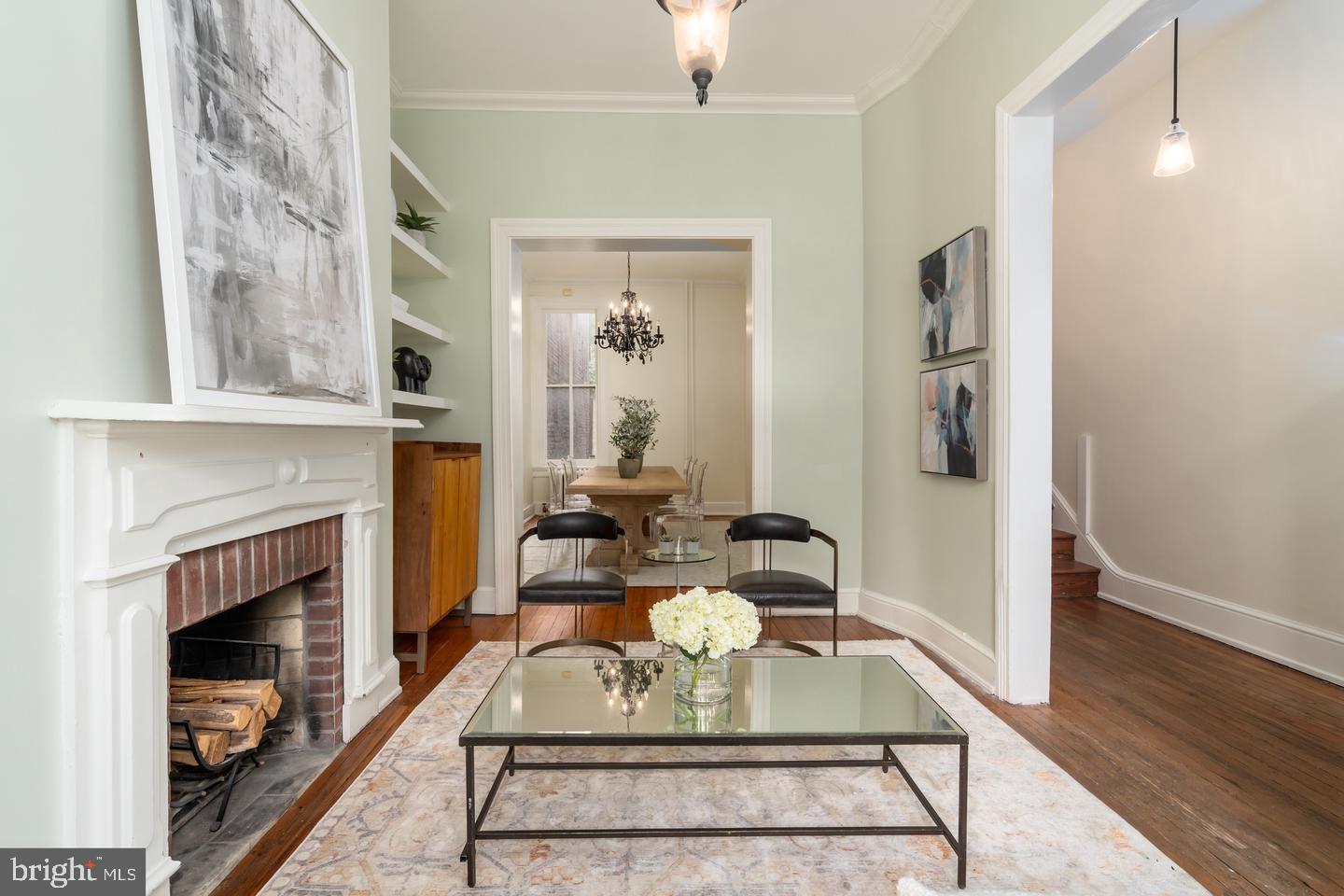 511 Independence Avenue Southeast Washington, DC 20003 - Photo 4 of 15 a living room with furniture and a fireplace
