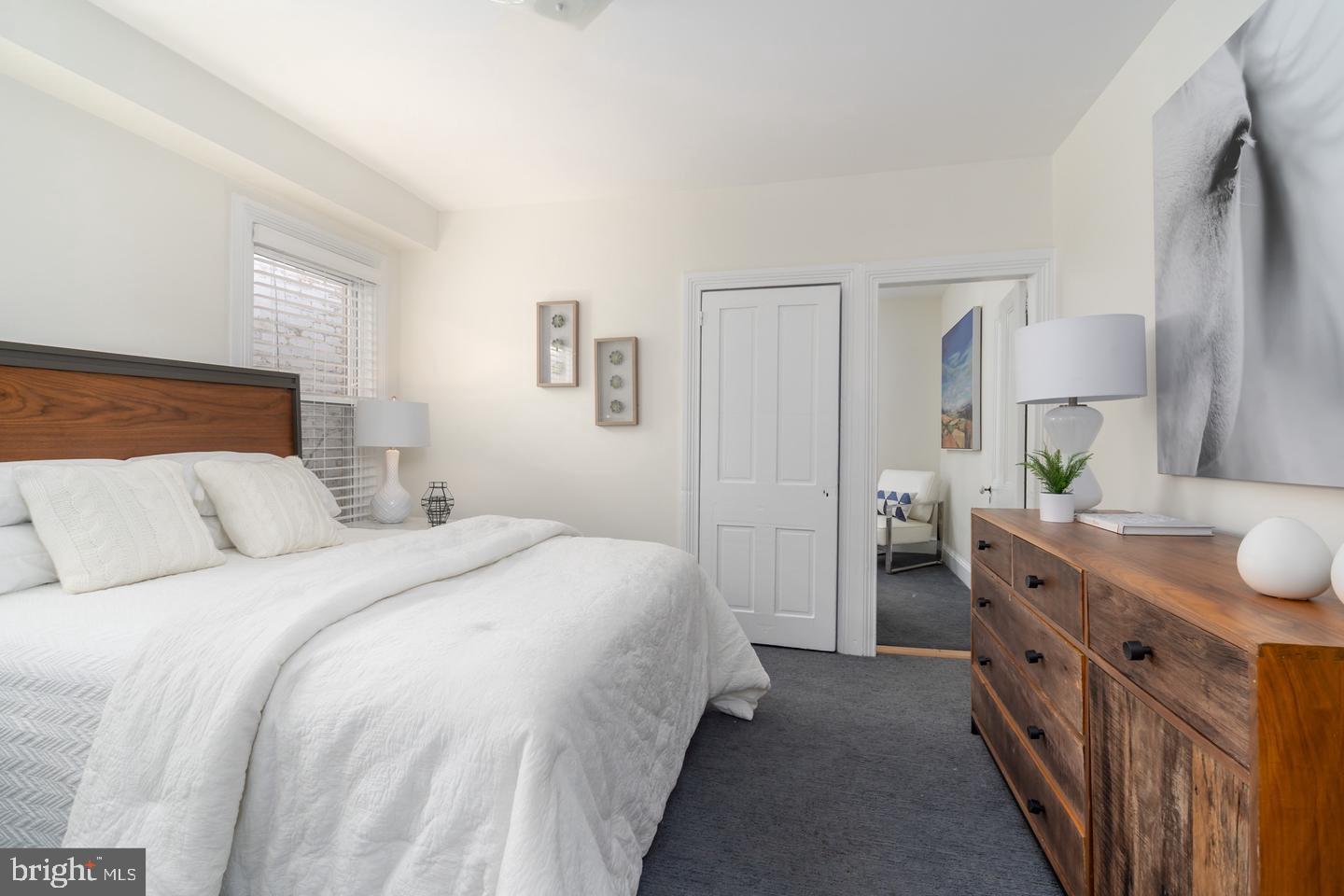 511 Independence Avenue Southeast Washington, DC 20003 - Photo 10 of 15 a spacious bedroom with a bed and a cabinets