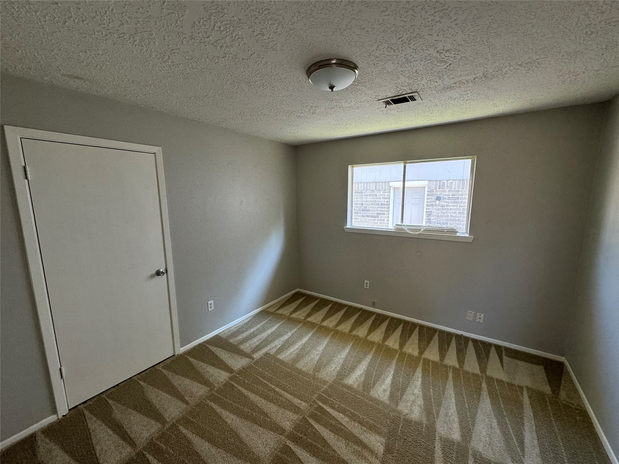 23227 Low Ridge Road Spring, TX 77373 - Photo 12 of 22 a view of room with window