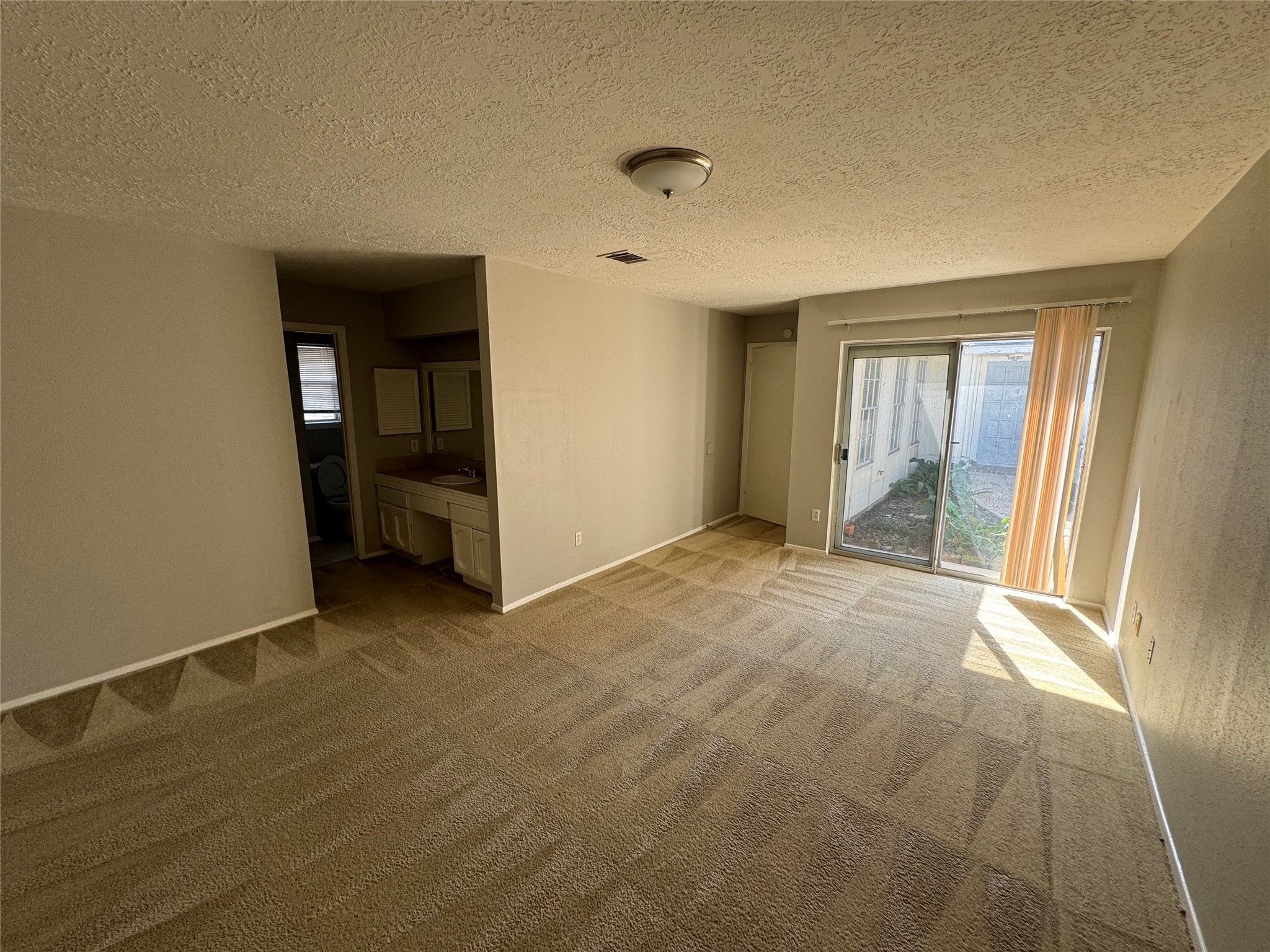 23227 Low Ridge Road Spring, TX 77373 - Photo 14 of 22 a view of an empty room with a window