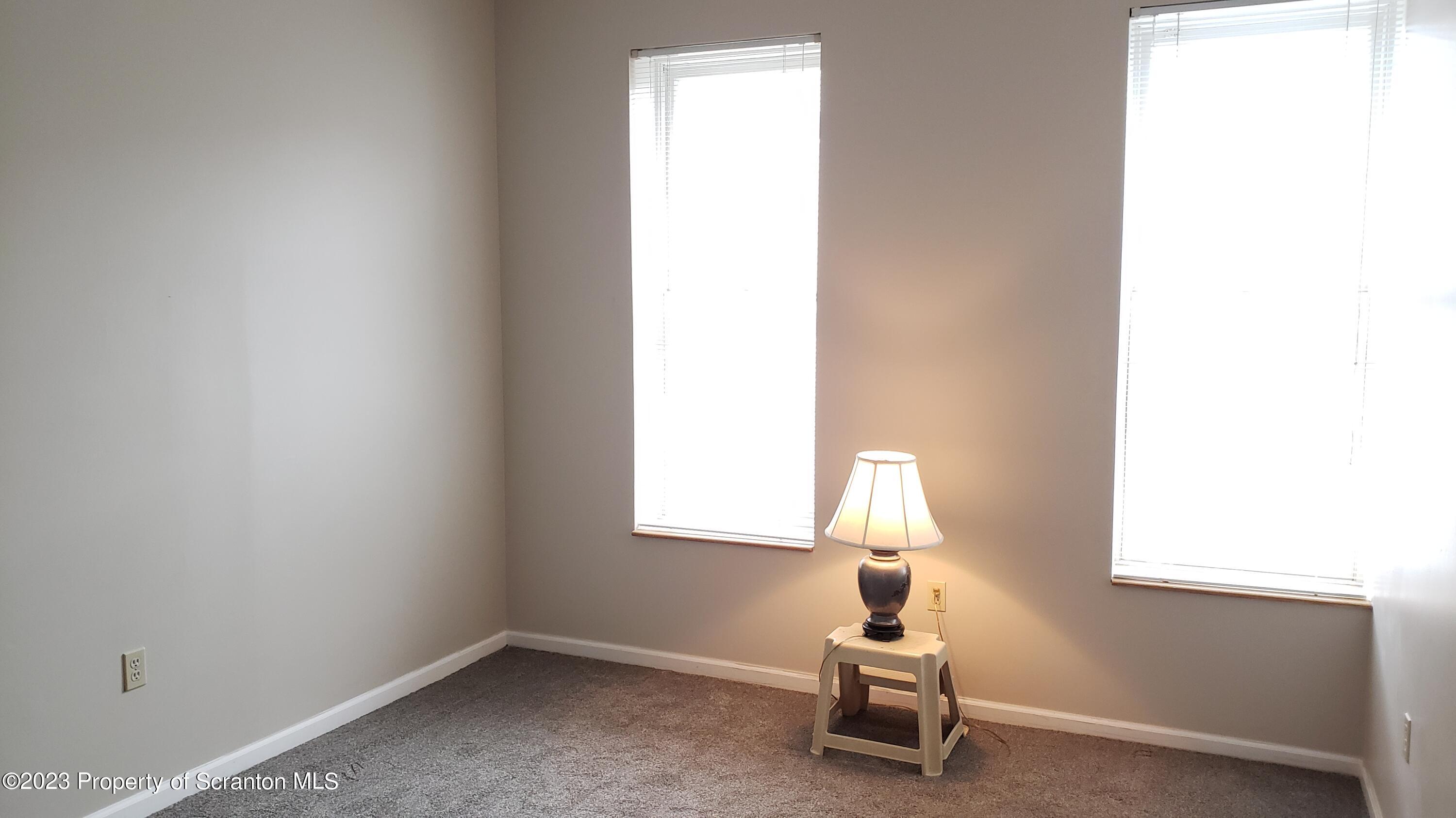 318 Penn Avenue Scranton, PA 18503 - Photo 20 of 70 a room with a window and a lamp
