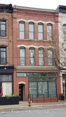 a building with a window and balcony