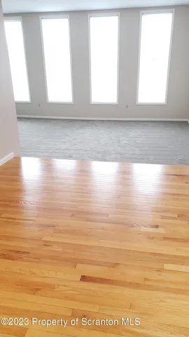 a bath tub sitting next to a white sink