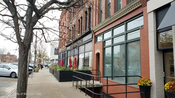 a car parked in front of a building