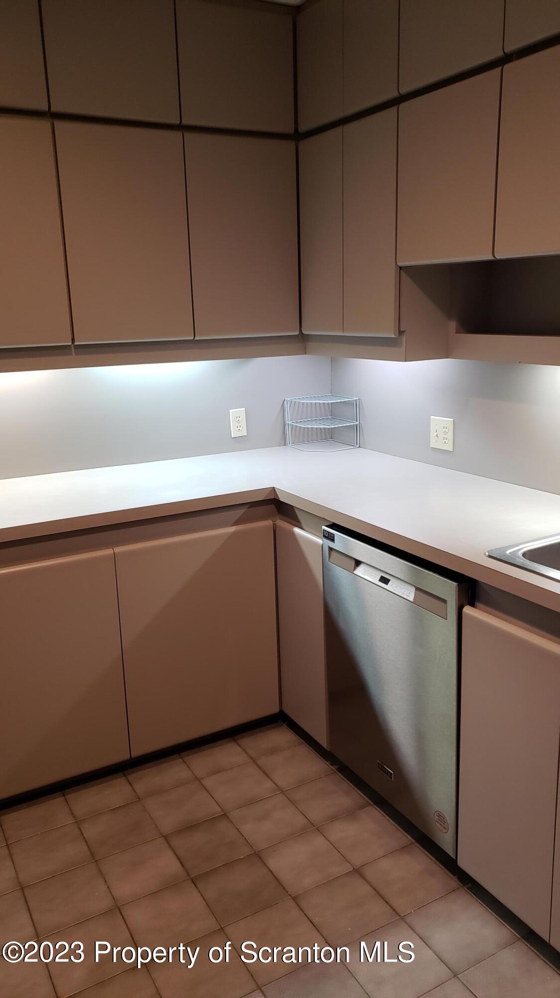 318 Penn Avenue Scranton, PA 18503 - Photo 58 of 70 a kitchen with a sink and cabinets