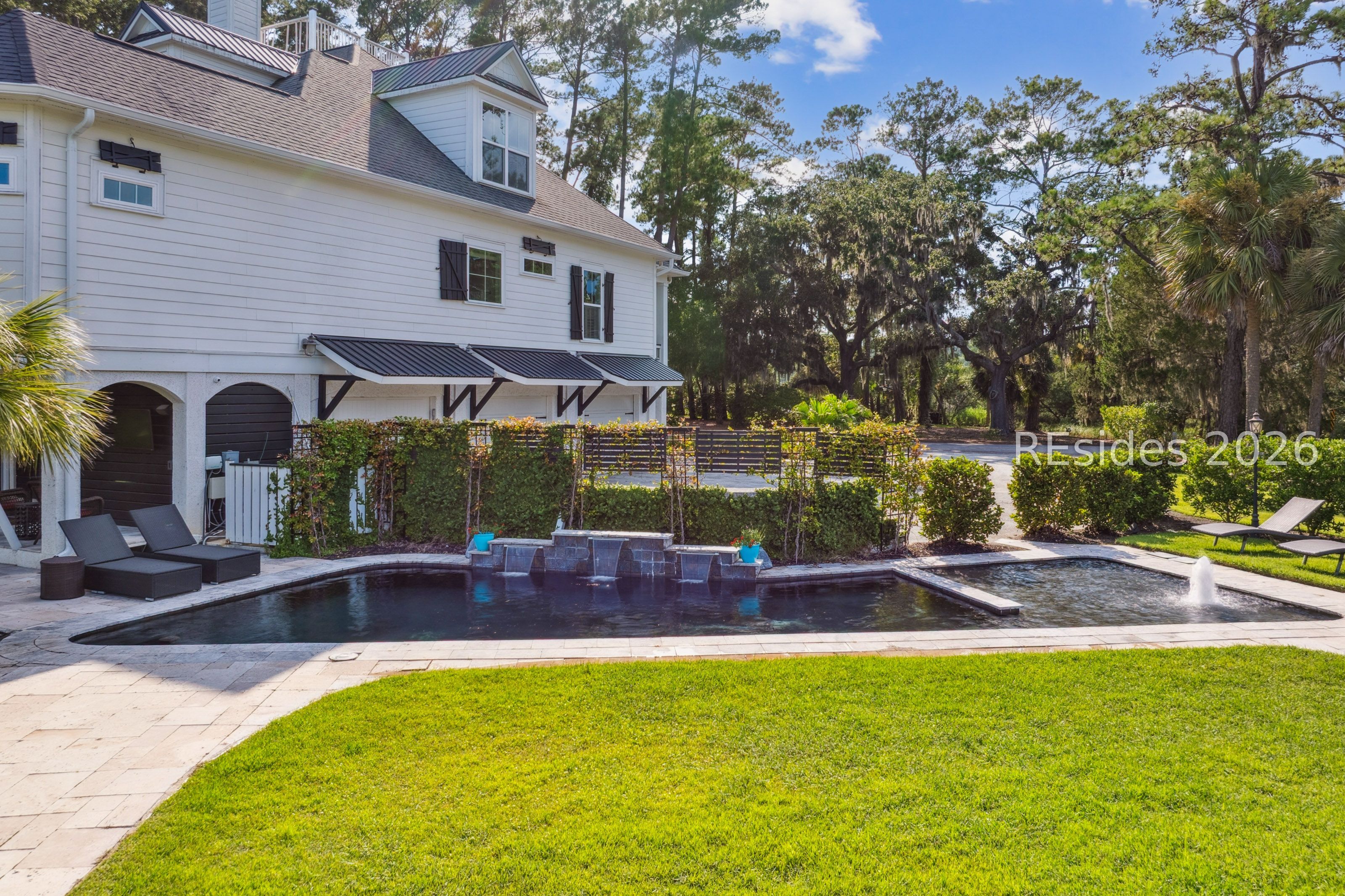 41 Buck Point Road Bluffton, SC 29910 - Photo 59 of 68 Relaxing pool with waterfall feature